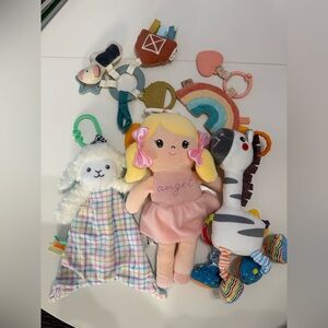 Lot of car seat and stroller toys.